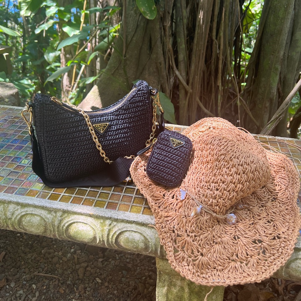 Prada raffia black and gold bag have receipt